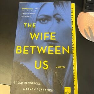 The Wife Between Us by Greer Hendricks & Sarah Pekkanen - Yellow Cover